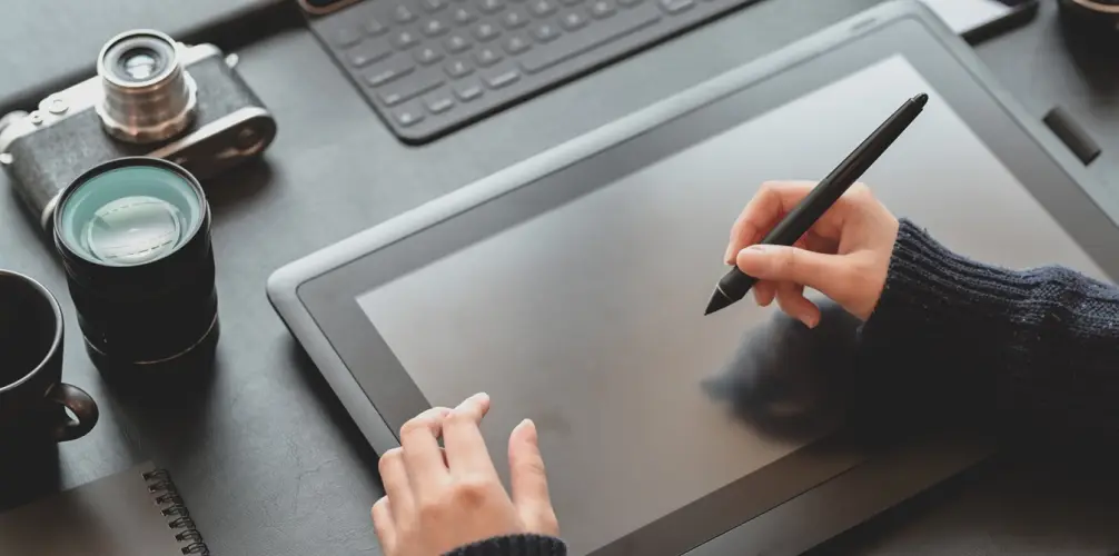 high-angle-view-person-using-mobile-phone-table.jpg