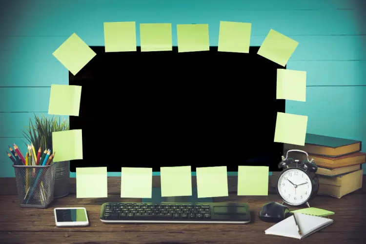organized-desk-with-post-it-notes-and-clock.jpg