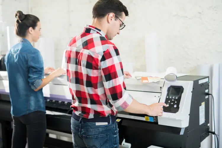 team-working-on-wide-format-printer.jpg