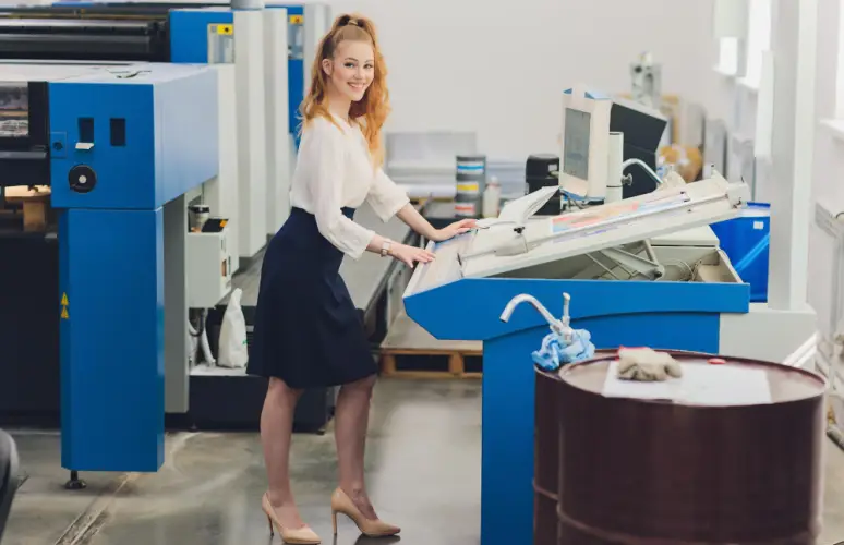 female-operator-working-on-print-shop-console.jpg