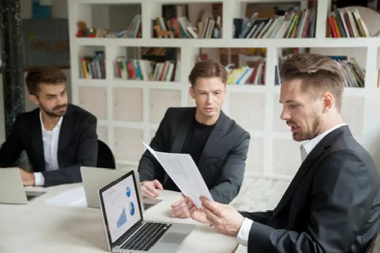 business-meeting-reviewing-reports.jpg