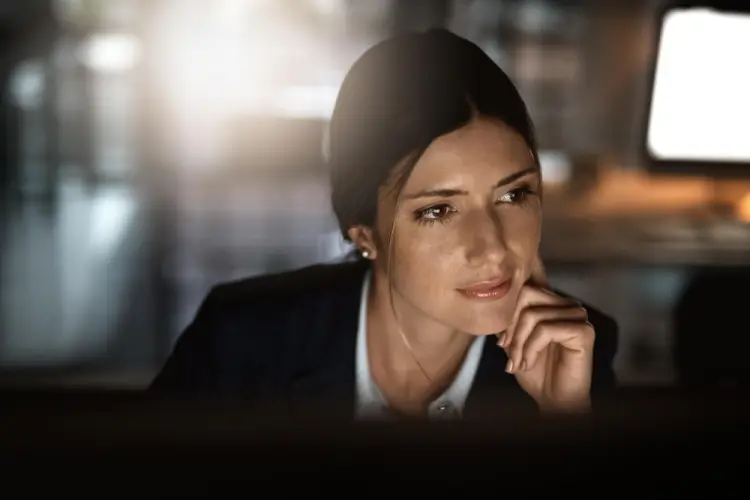 thoughtful-businesswoman-working-night.jpg