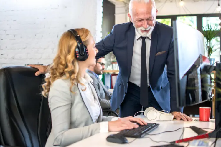 senior-manager-guiding-employee.jpg