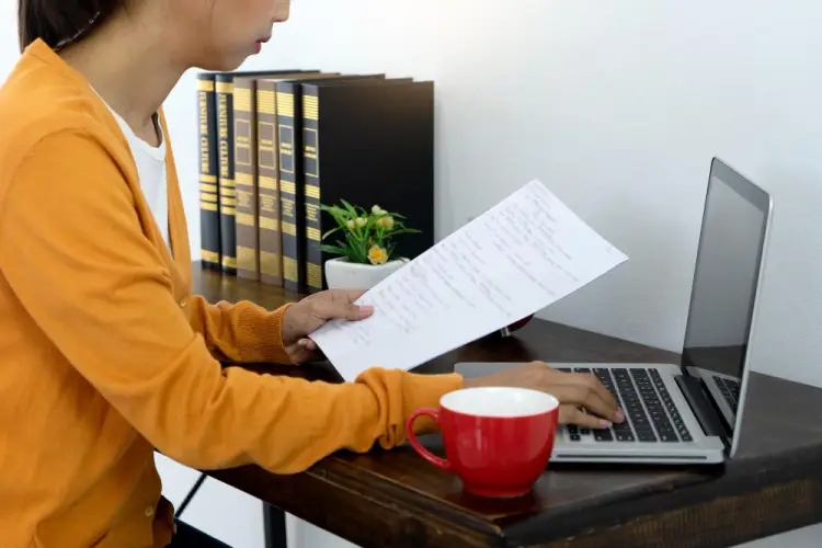 woman-working-on-translation-with-document.jpg