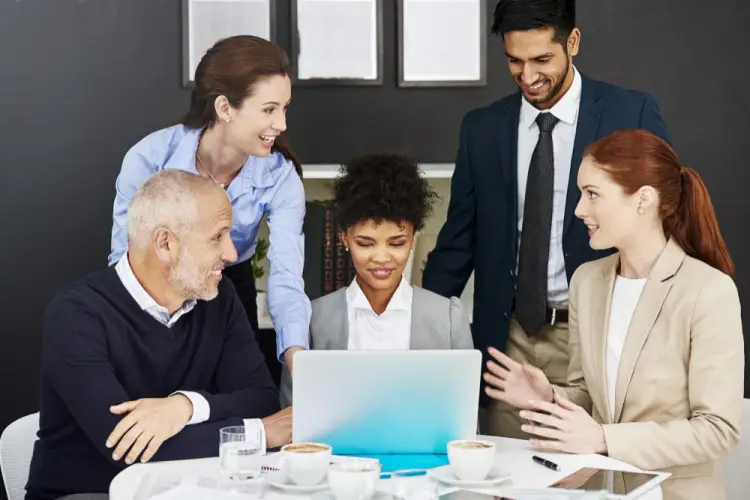 group-discussion-around-laptop.jpg