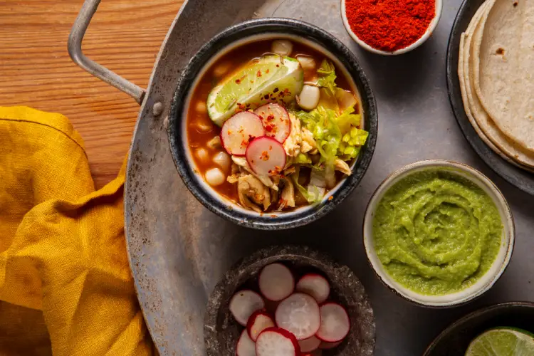 pozole-soup-bowl-with-radishes-and-lime.jpg