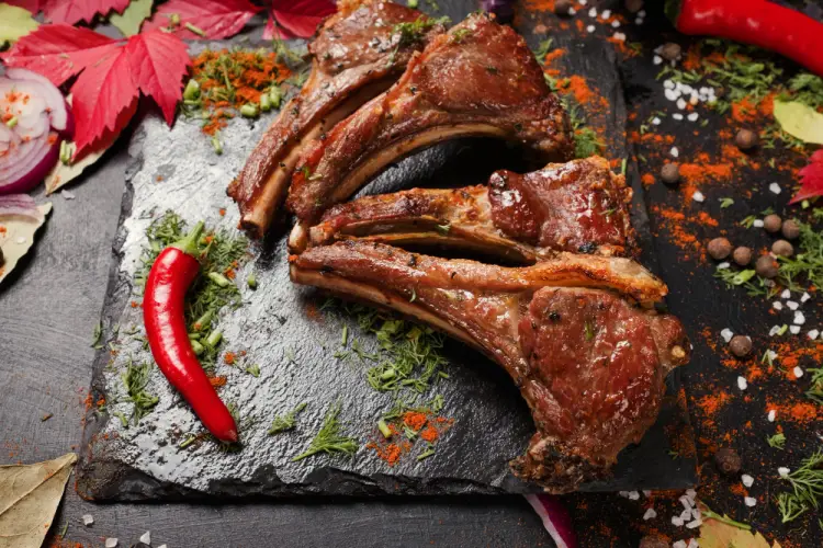 grilled-lamb-chops-on-slate-with-spices-and-chili.jpg