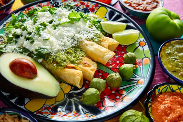 green-salsa-enchiladas-plate-with-avocado.jpg