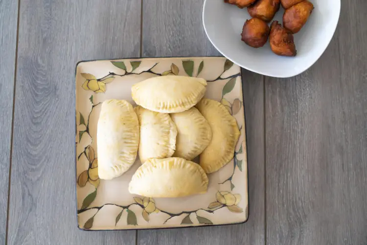 nigerian-meat-pie-on-floral-plate-with-puff-puff.jpg