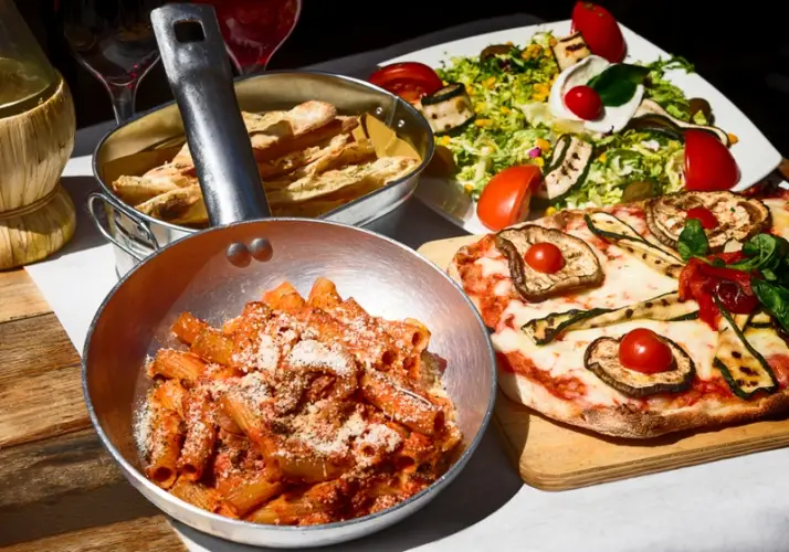 rigatoni_tomato_sauce_pizza_salad_breadsticks.jpg