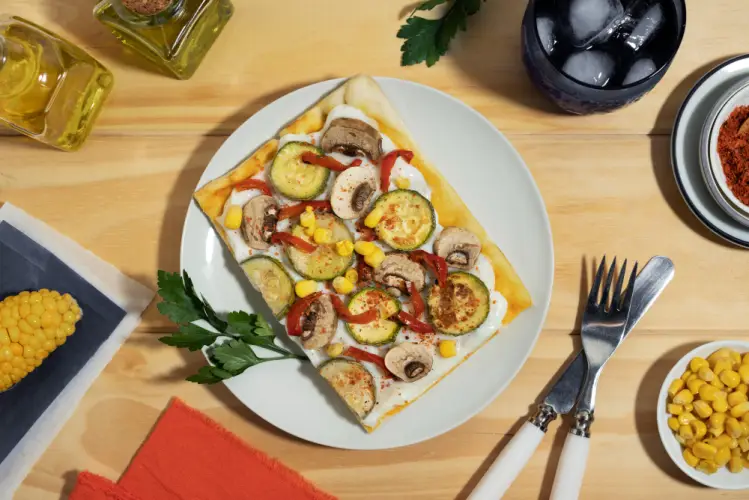vegetarian_pizza_slice_with_corn_and_zucchini.jpg
