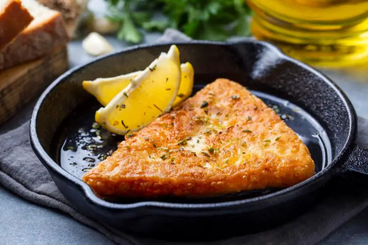 saganaki-in-cast-iron-skillet-with-lemon.jpg