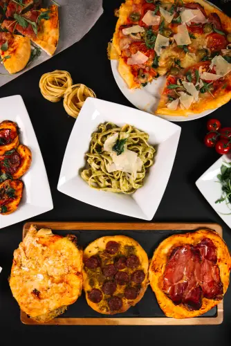 italian_pizza_pesto_pasta_variety_overhead.jpg