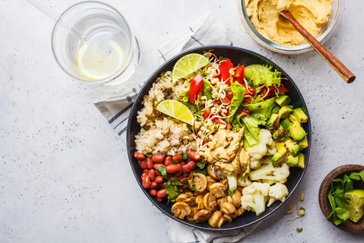 nourishing-vegan-bowl-with-brown-rice-beans-and-avocado.jpg