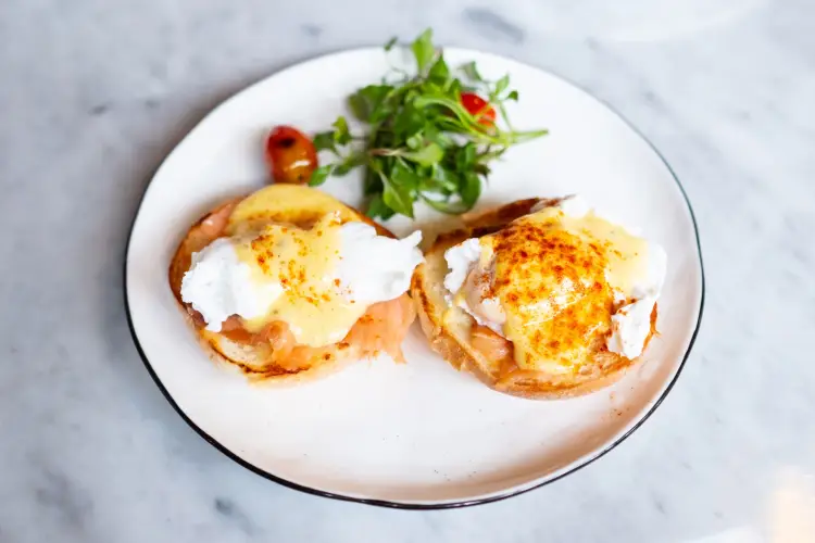 eggs-benedict-with-salad-on-plate (1).jpg