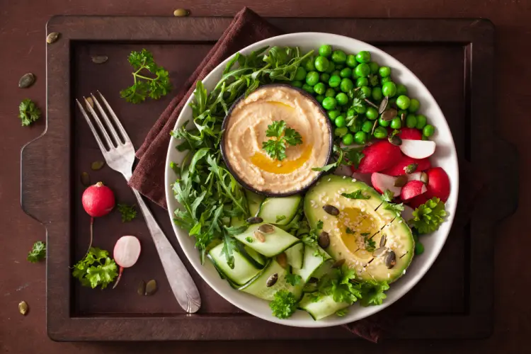 healthy-plant-based-bowl-with-hummus-avocado-and-greens.jpg