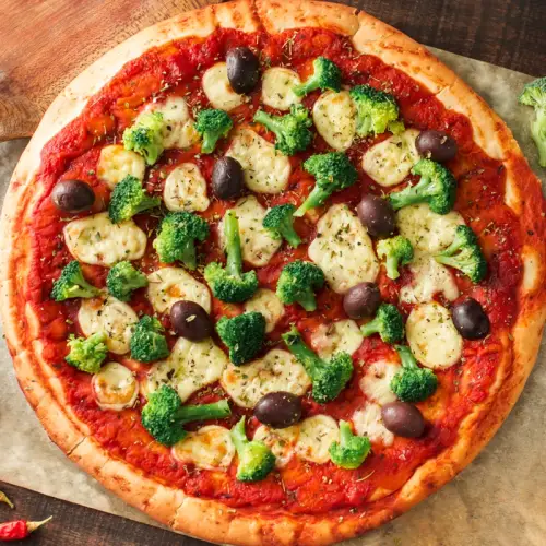 vegetarian-pizza-with-broccoli-zucchini-and-black-olives.jpg