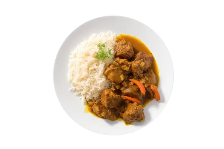 curry-goat-with-rice-on-white-plate.jpg