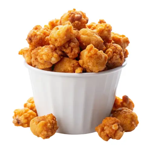 bucket-of-crispy-popcorn-chicken-on-white-background.jpg