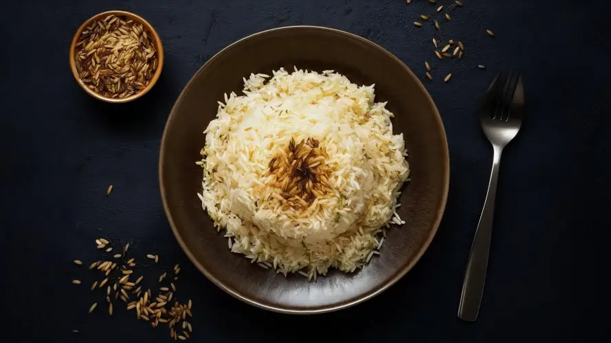 top-view-delicious-cooked-rice-plain-tasty-rice-inside-brown-plate-dark-space.jpg